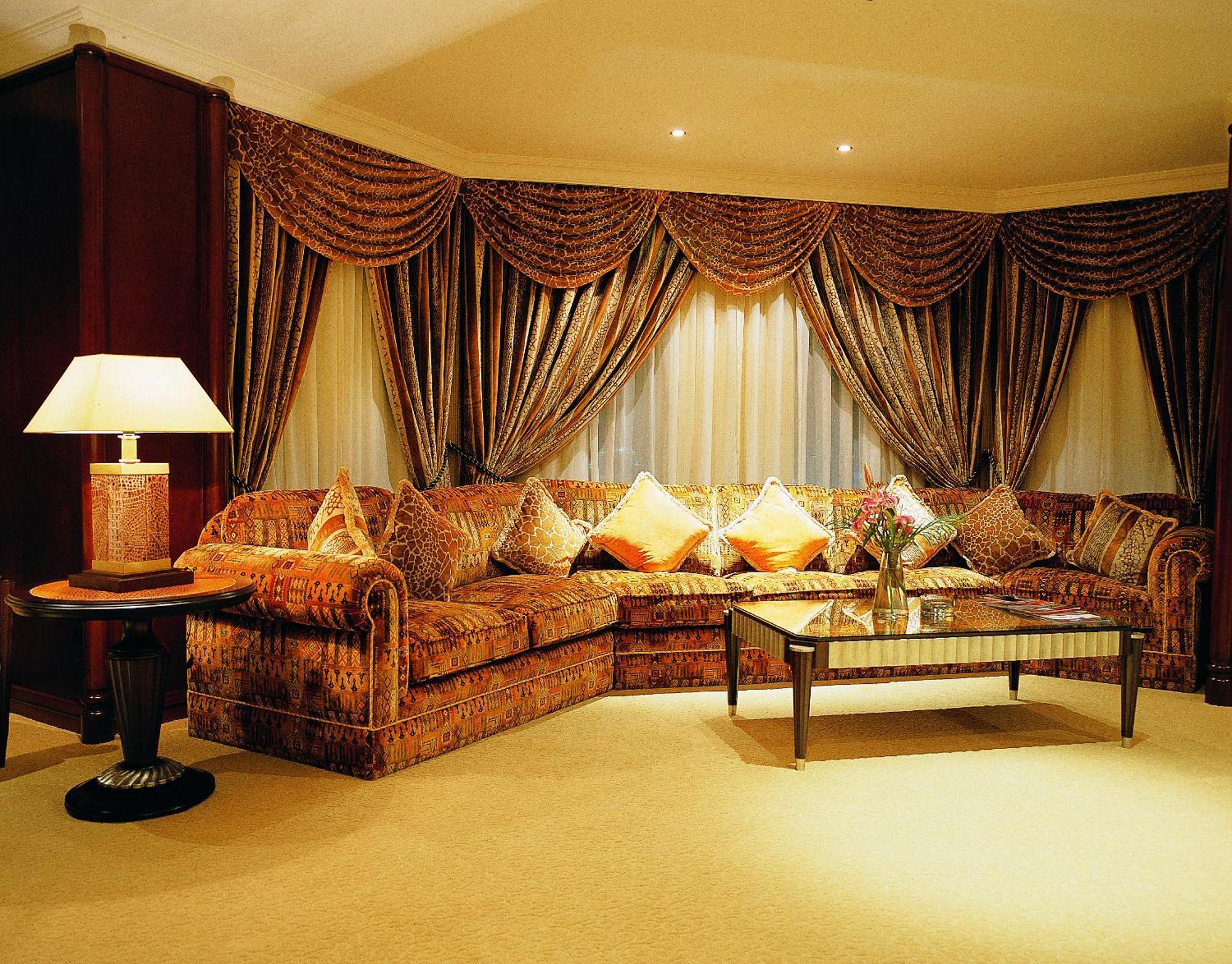 Grand Regency Doha, Trademark Collection By Wyndham מראה חיצוני תמונה A living room