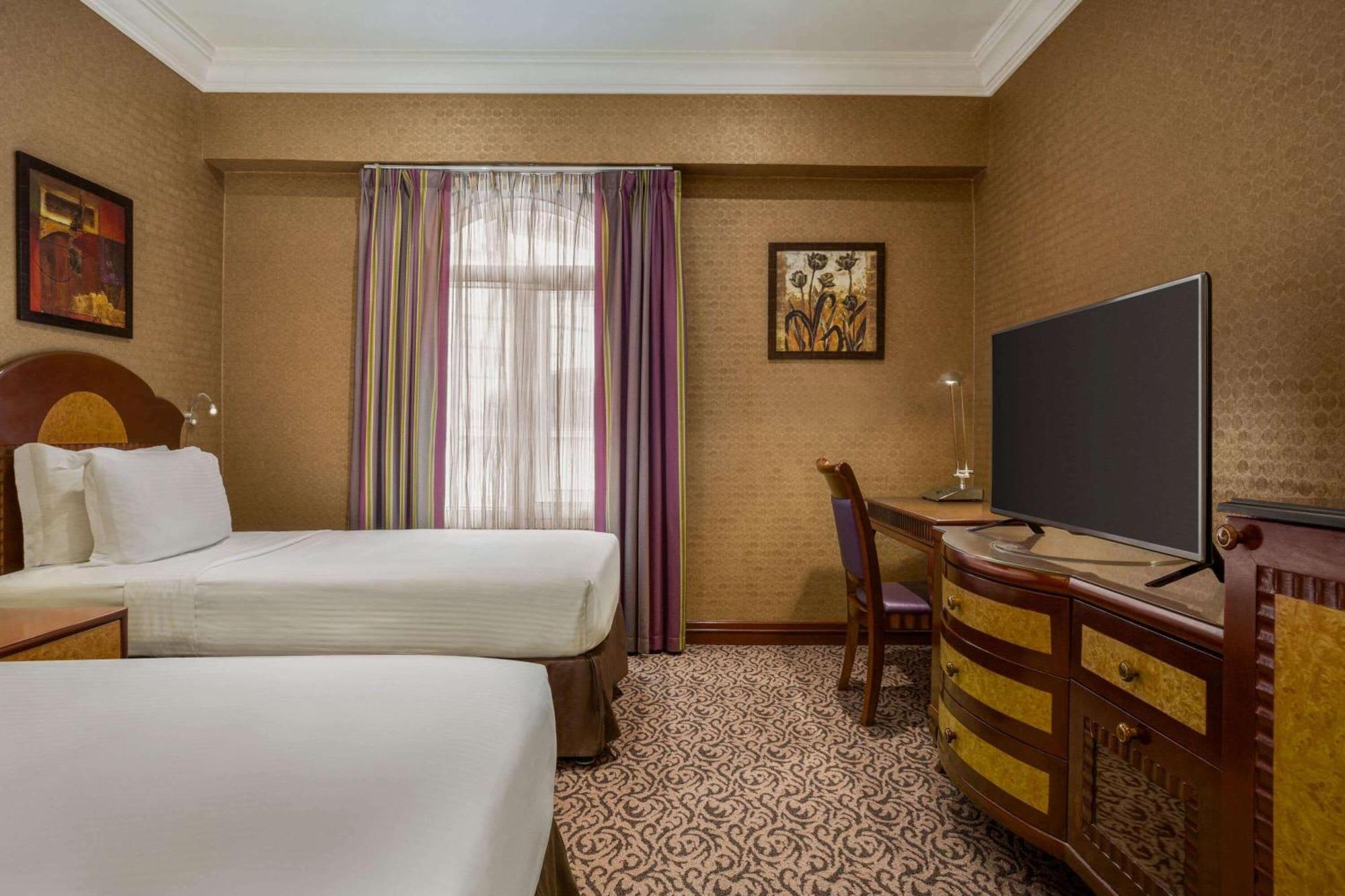 Grand Regency Doha, Trademark Collection By Wyndham מראה חיצוני תמונה A room at the Hilton London Paddington